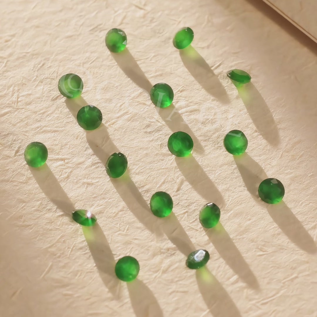 Load video: Imperial Green Jadeite Diamond Cut Facets